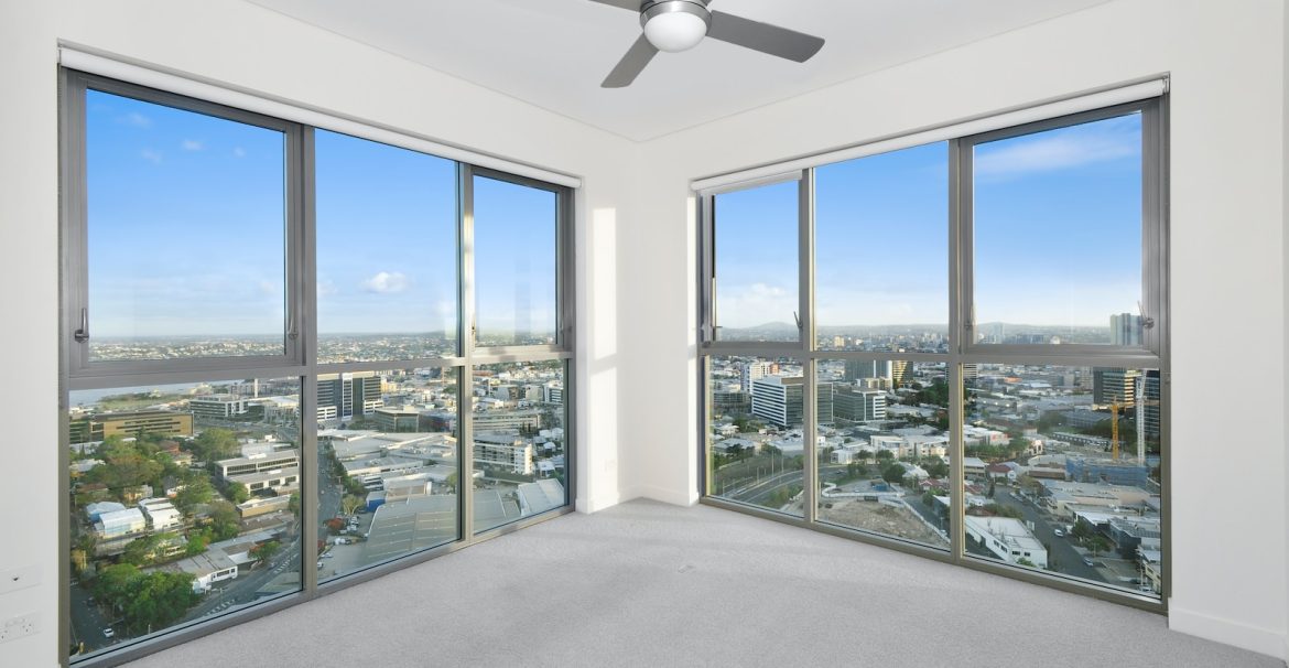 ceiling fan near windows
