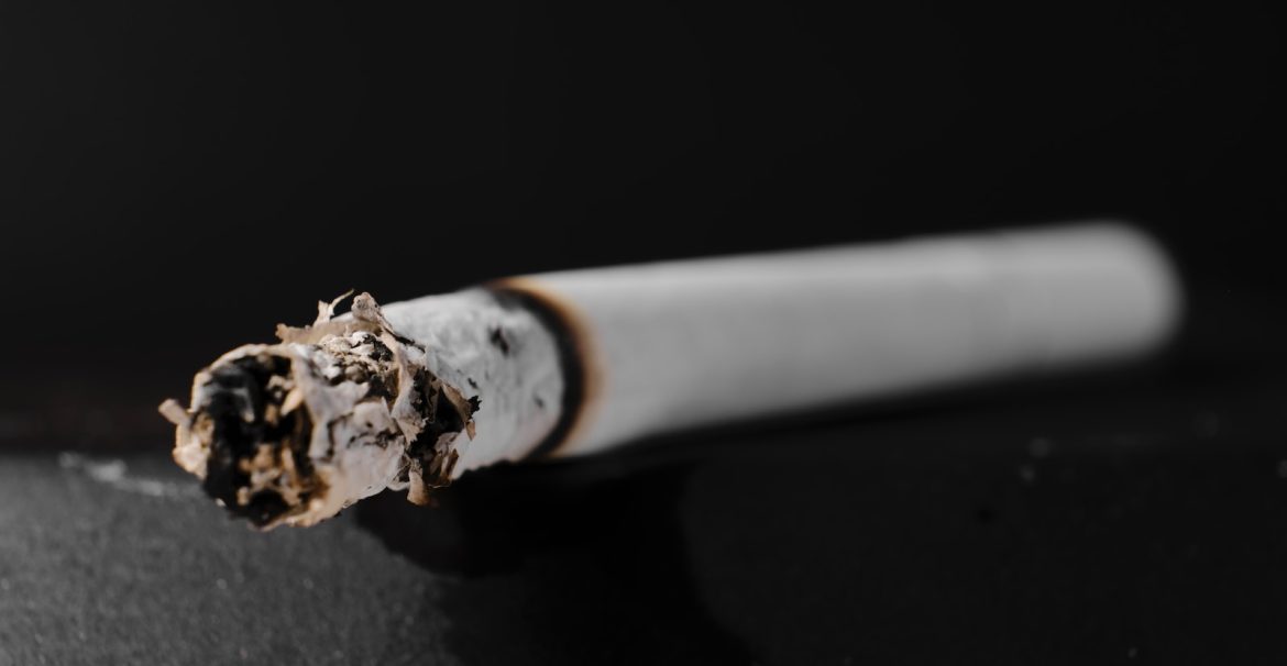 a close up of a cigarette on a table