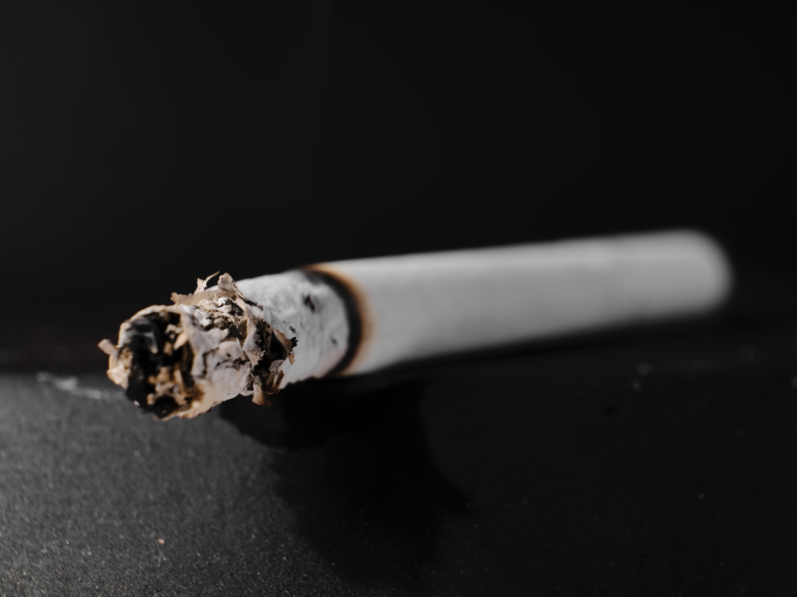 a close up of a cigarette on a table